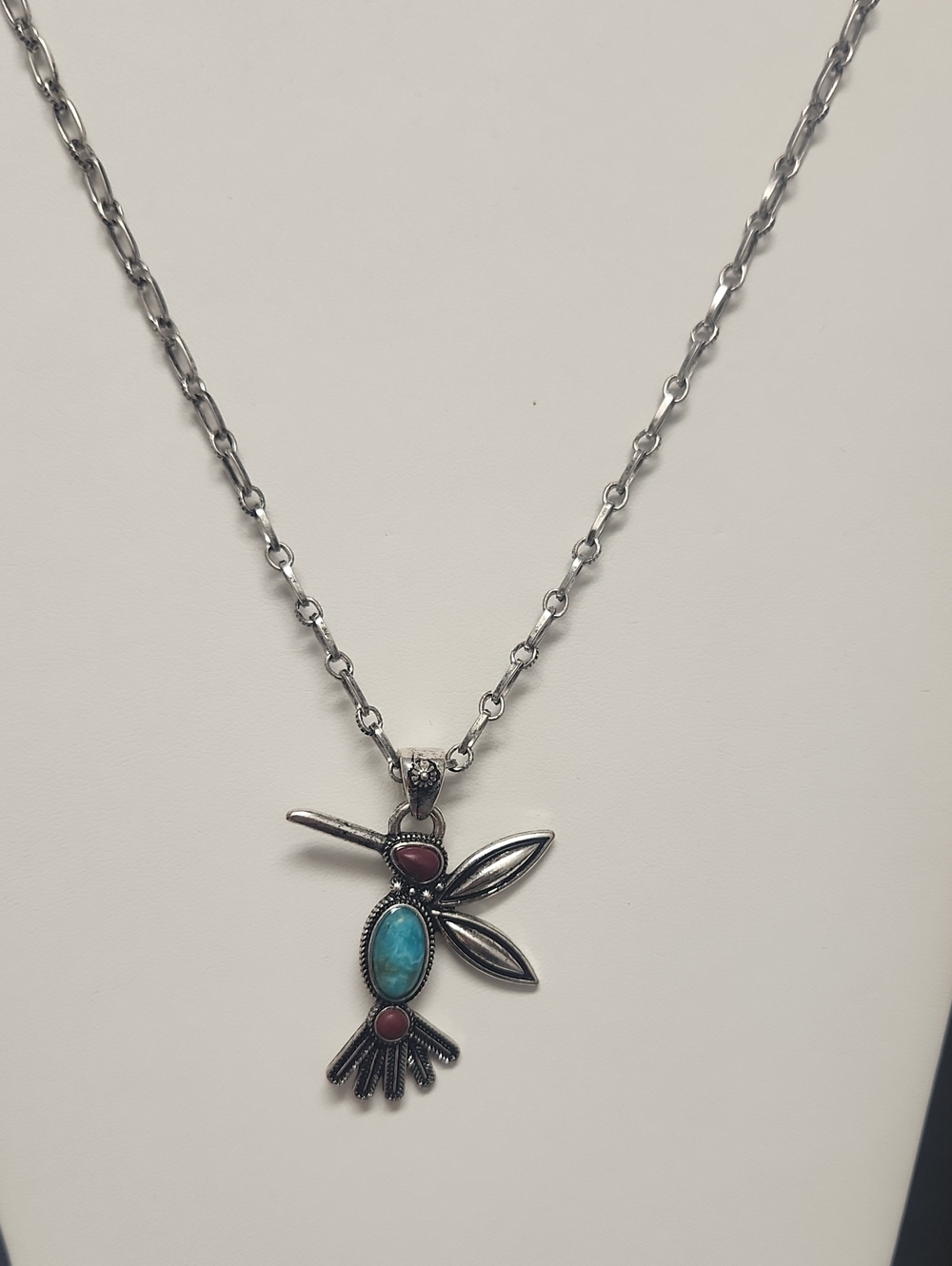 Silver Tone Hummingbird Pendant Necklace with Turquoise and Coral Accents